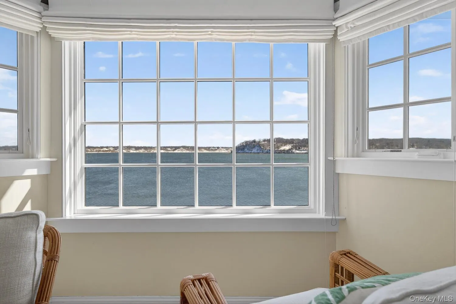 Primary Bedroom sitting area with expansive water views Primary Bedroom sitting area with expansive water views