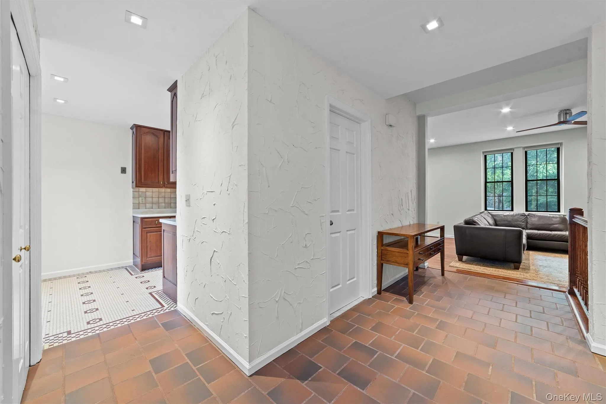 Offering a large storage closet and convenient half bath on the main floor Offering a large storage closet and convenient half bath on the main floor