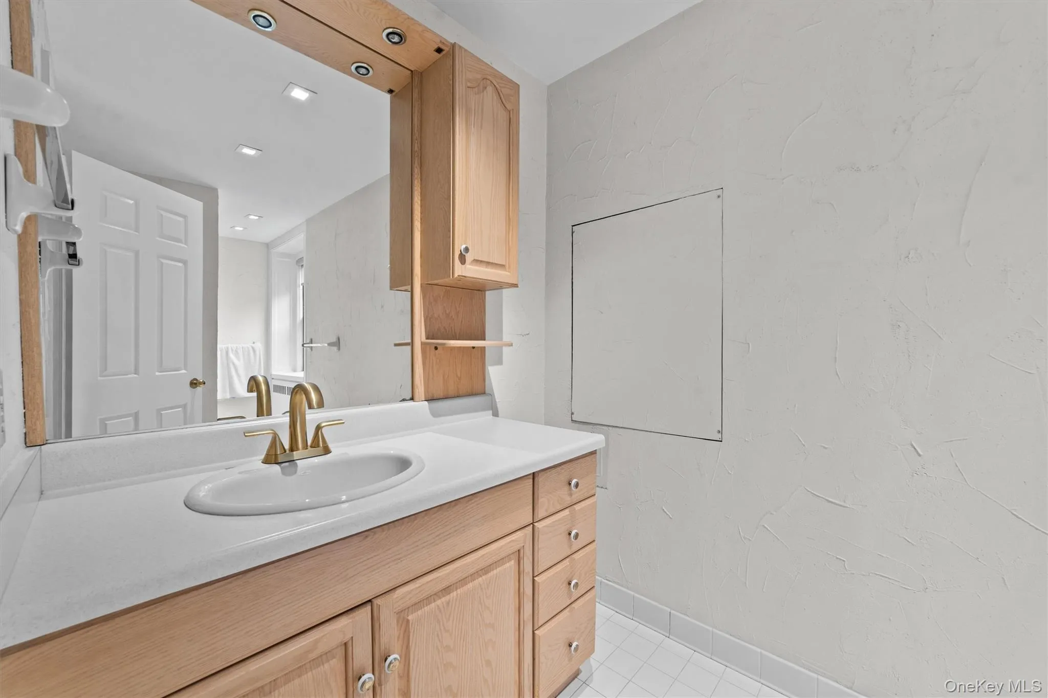Three piece primary full bathroom with soaker tub Three piece primary full bathroom with soaker tub