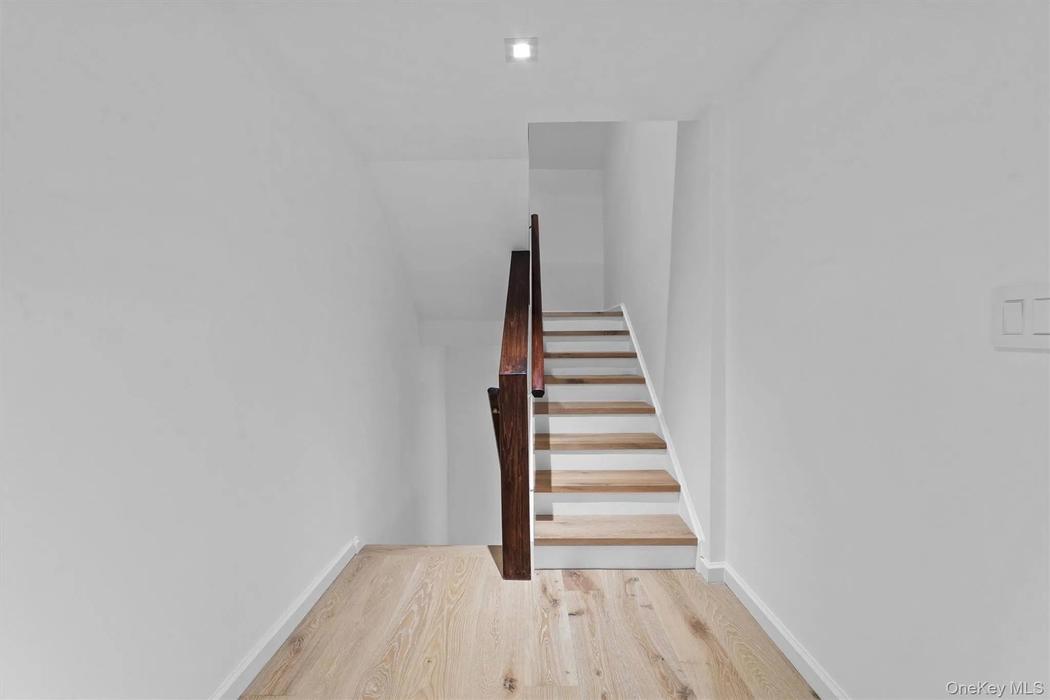 Stairs leading to the third floor second bedroom and bath Stairs leading to the third floor second bedroom and bath