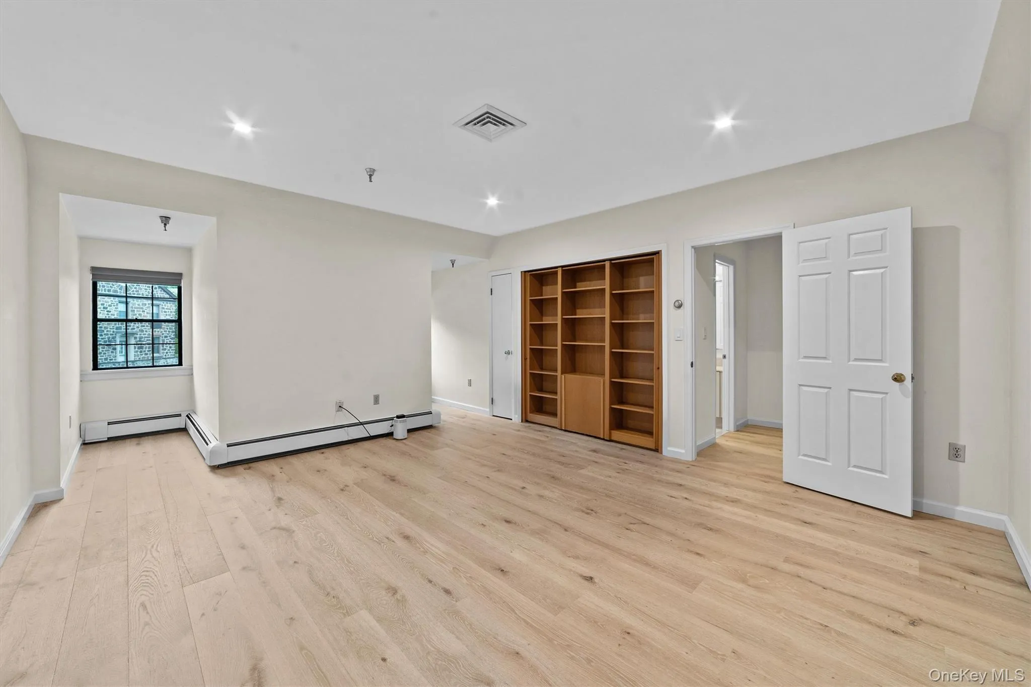 Second bedroom for with a Murphy bed — perfect for a home office, guest suite, or creative studio. Second bedroom for with a Murphy bed — perfect for a home office, guest suite, or creative studio.