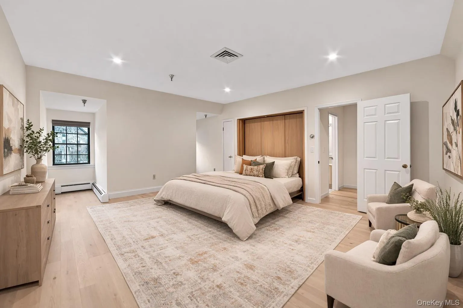 Second bedroom for with a Murphy bed — perfect for a home office, guest suite, or creative studio. Second bedroom for with a Murphy bed — perfect for a home office, guest suite, or creative studio.