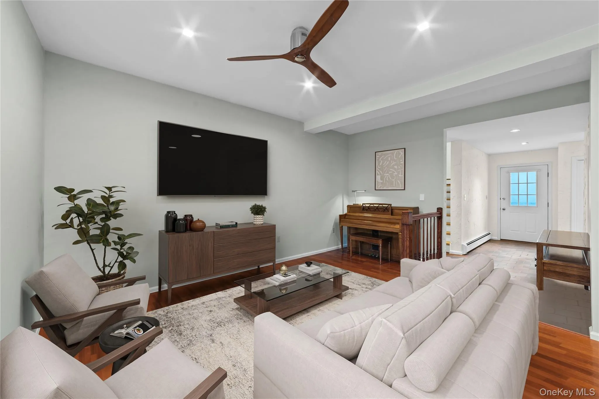 Open concept living and dining space with lots of room to entertain - virtually staged Open concept living and dining space with lots of room to entertain - virtually staged
