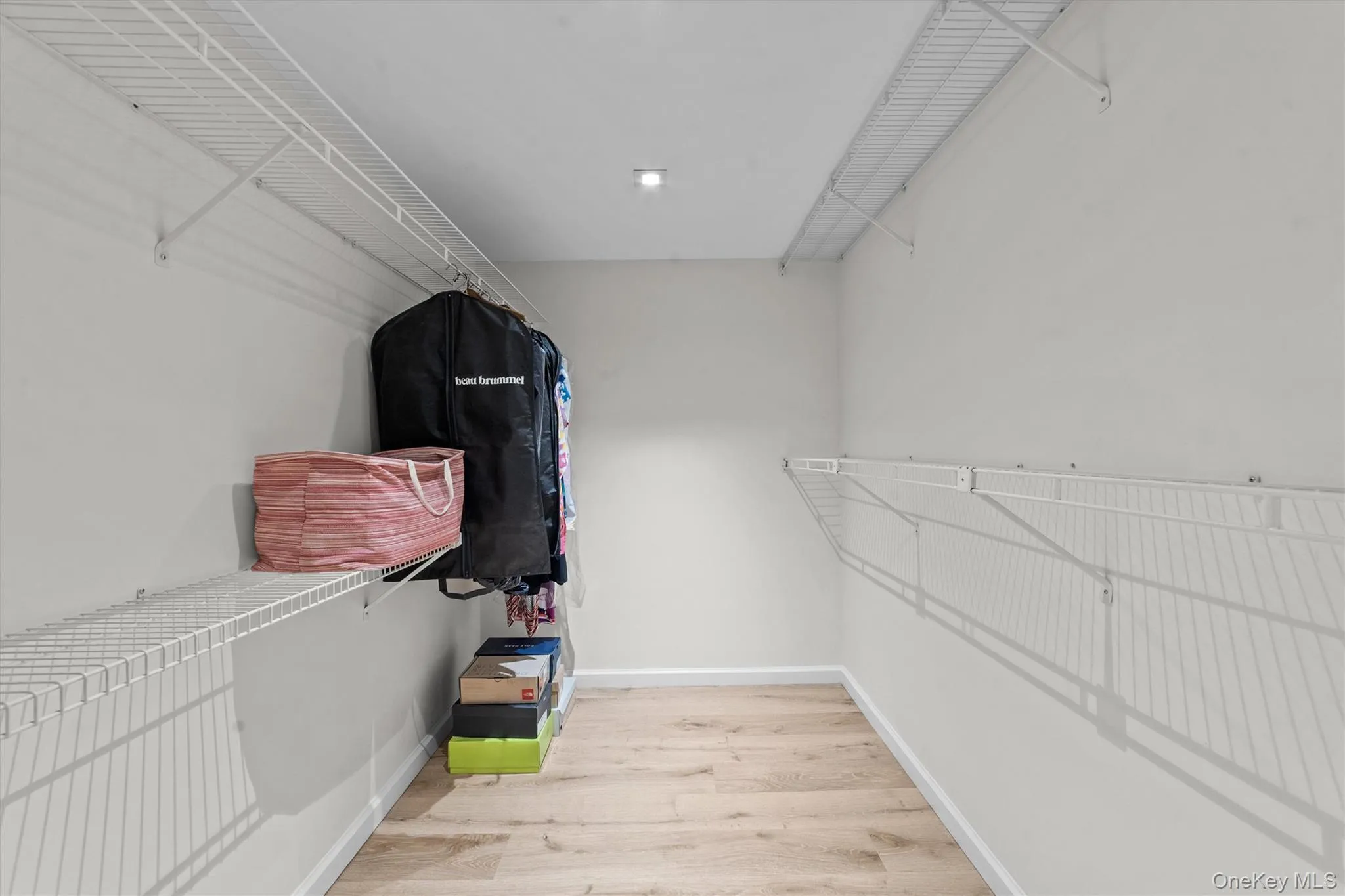 Large walk-in closet for your expansive shoe collection Large walk-in closet for your expansive shoe collection