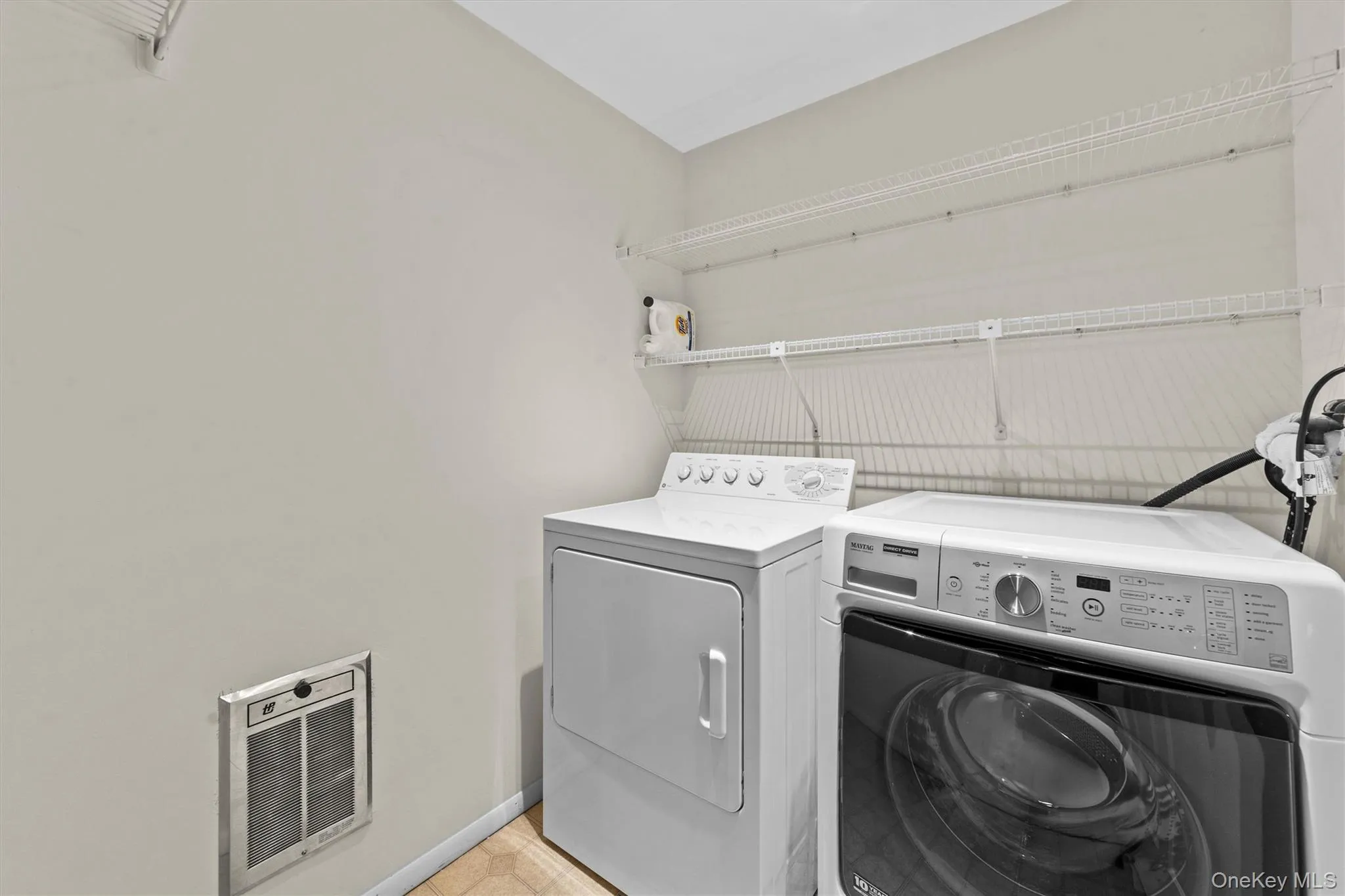 Conveniently located second floor laundry room just off the primary suite Conveniently located second floor laundry room just off the primary suite