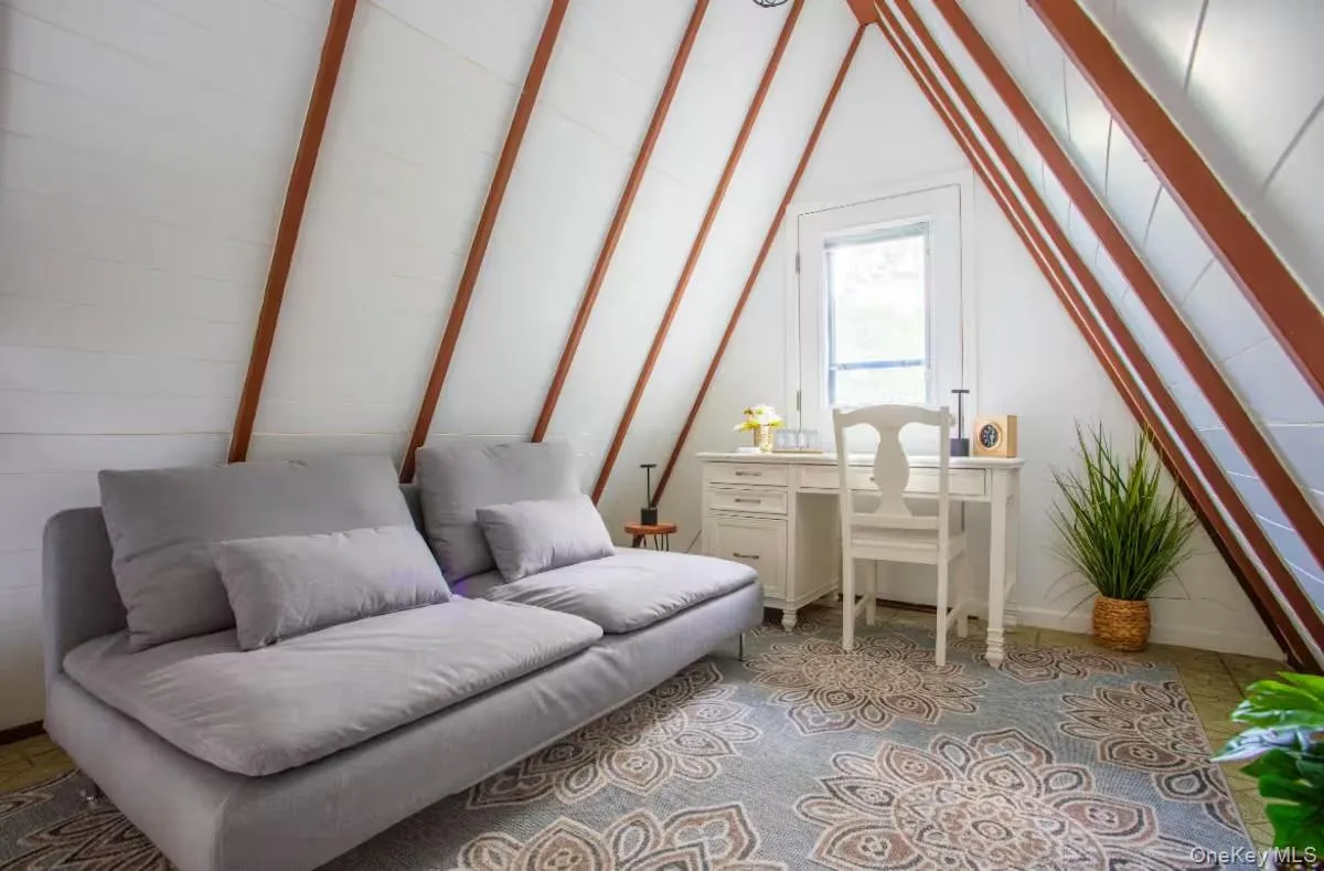 Loft with work space and futon Loft with work space and futon