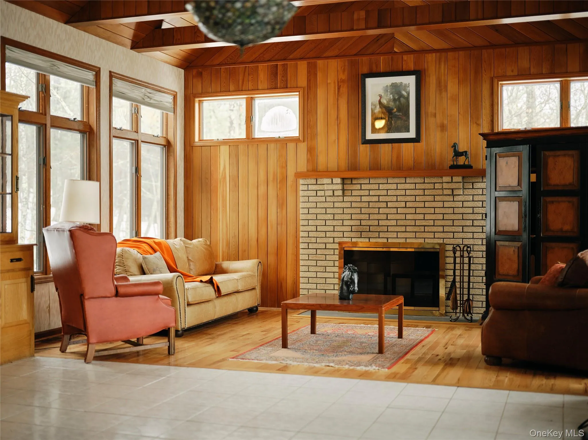 Living room with fireplace & vaulted ceiling Living room with fireplace & vaulted ceiling