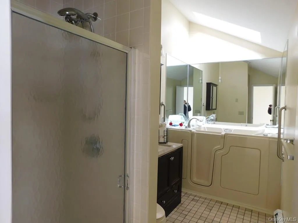 Primary full bath with walk in jetted tub & separate stand up shower. Primary full bath with walk in jetted tub & separate stand up shower.