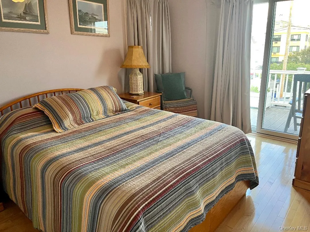 2nd floor bedroom w/sliding doors to Ocean view upper deck 2nd floor bedroom w/sliding doors to Ocean view upper deck