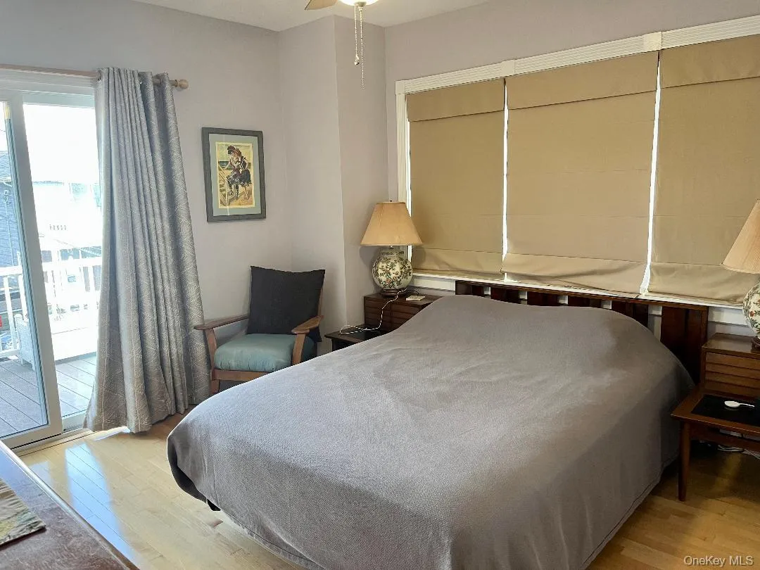 2nd floor bedroom w/sliding doors to Ocean view upper deck 2nd floor bedroom w/sliding doors to Ocean view upper deck