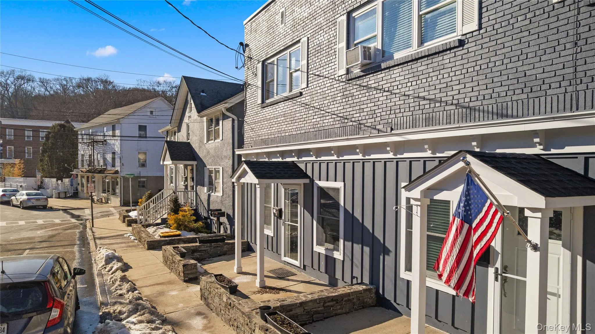 Great curb appeal with a front patio. Great curb appeal with a front patio.