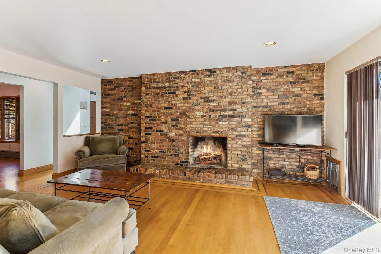 Family Room with Fireplace, Off Kitchen - Photo 2 Family Room with Fireplace, Off Kitchen - Photo 2