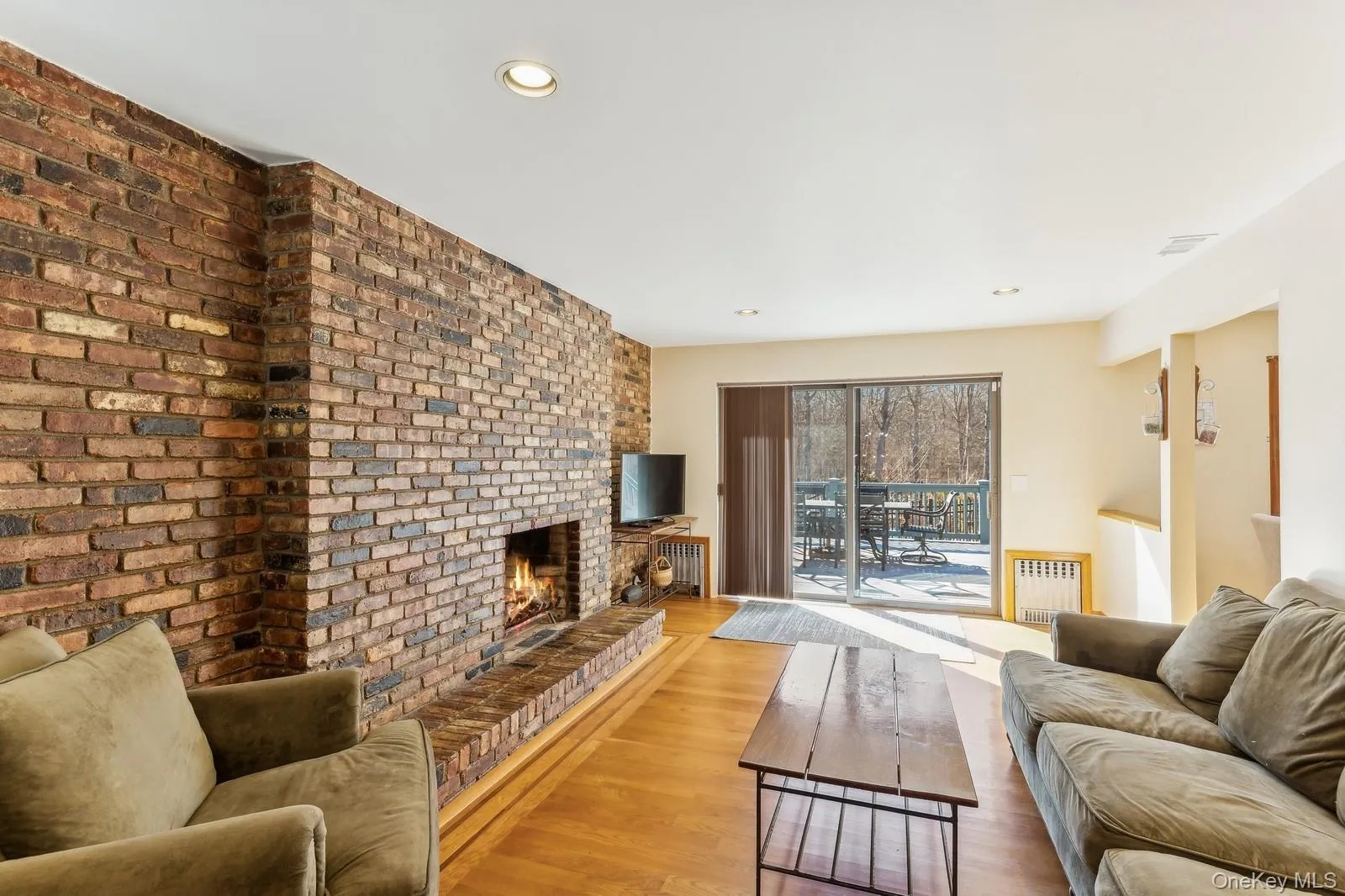 Family Room with Fireplace, Off Kitchen - Photo 1 Family Room with Fireplace, Off Kitchen - Photo 1