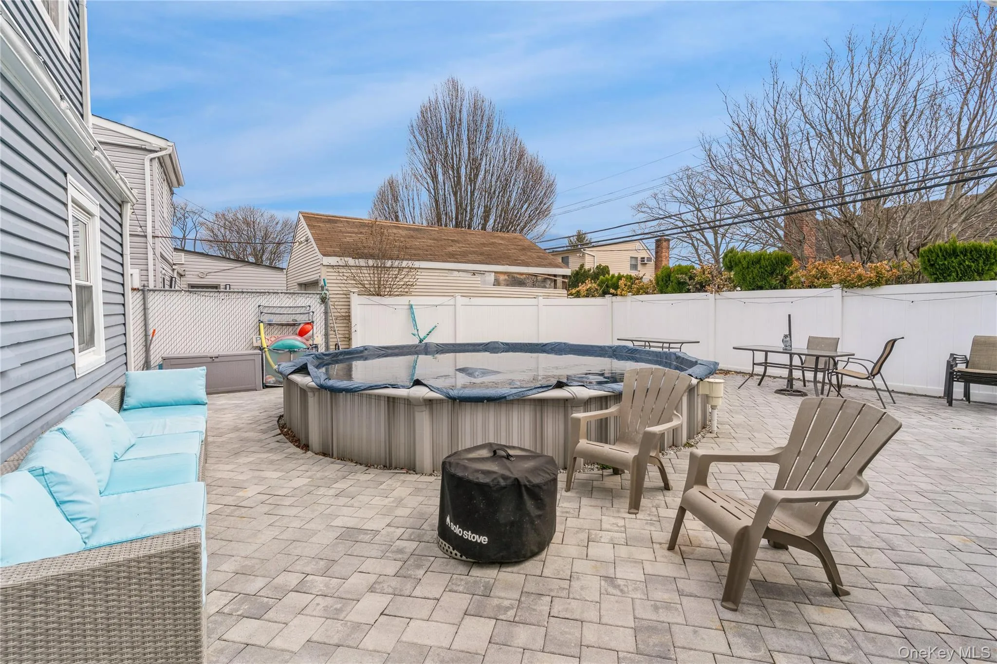 Yard with pool and pavers Yard with pool and pavers