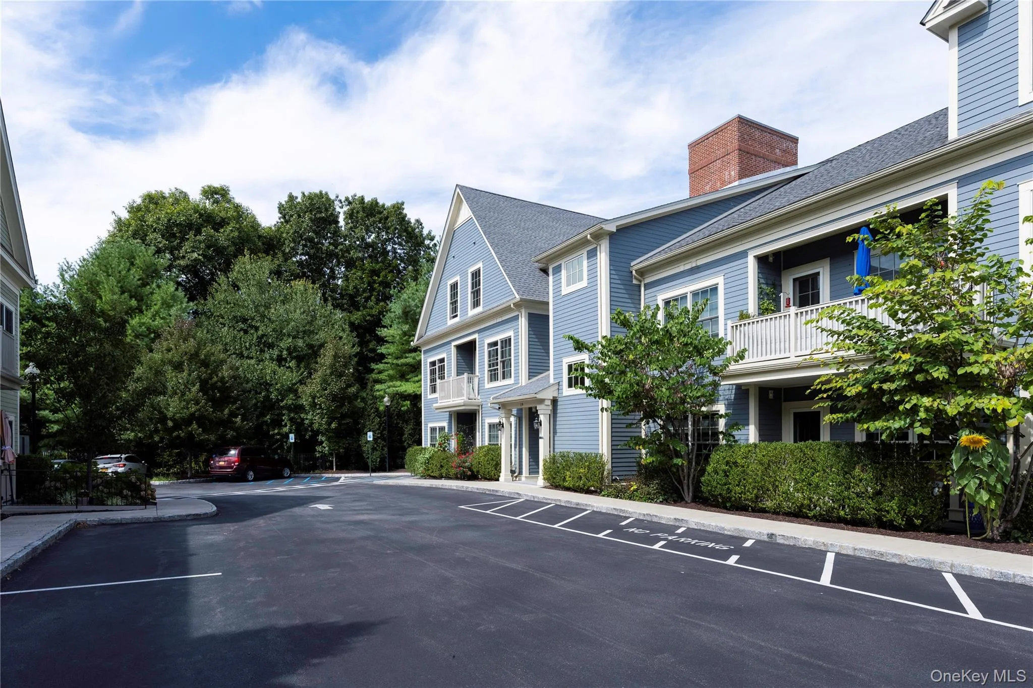 Butterfield building providing access to the community room, outdoor shared space with BBQ and firepit. Butterfield building providing access to the community room, outdoor shared space with BBQ and firepit.