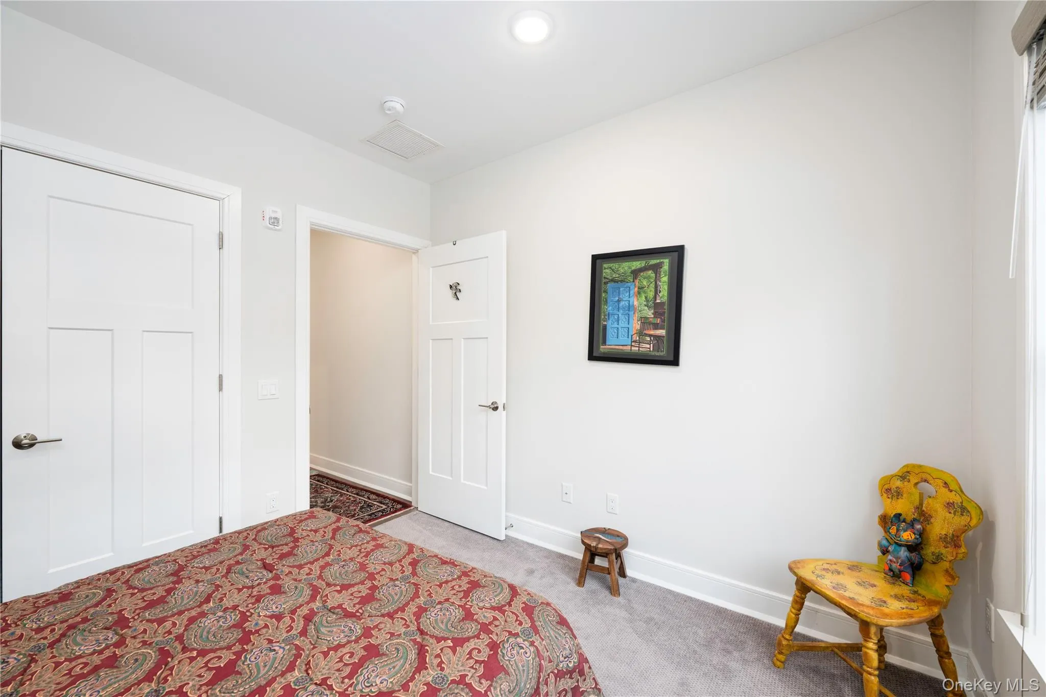 Guest bedroom with full closet. Guest bedroom with full closet.