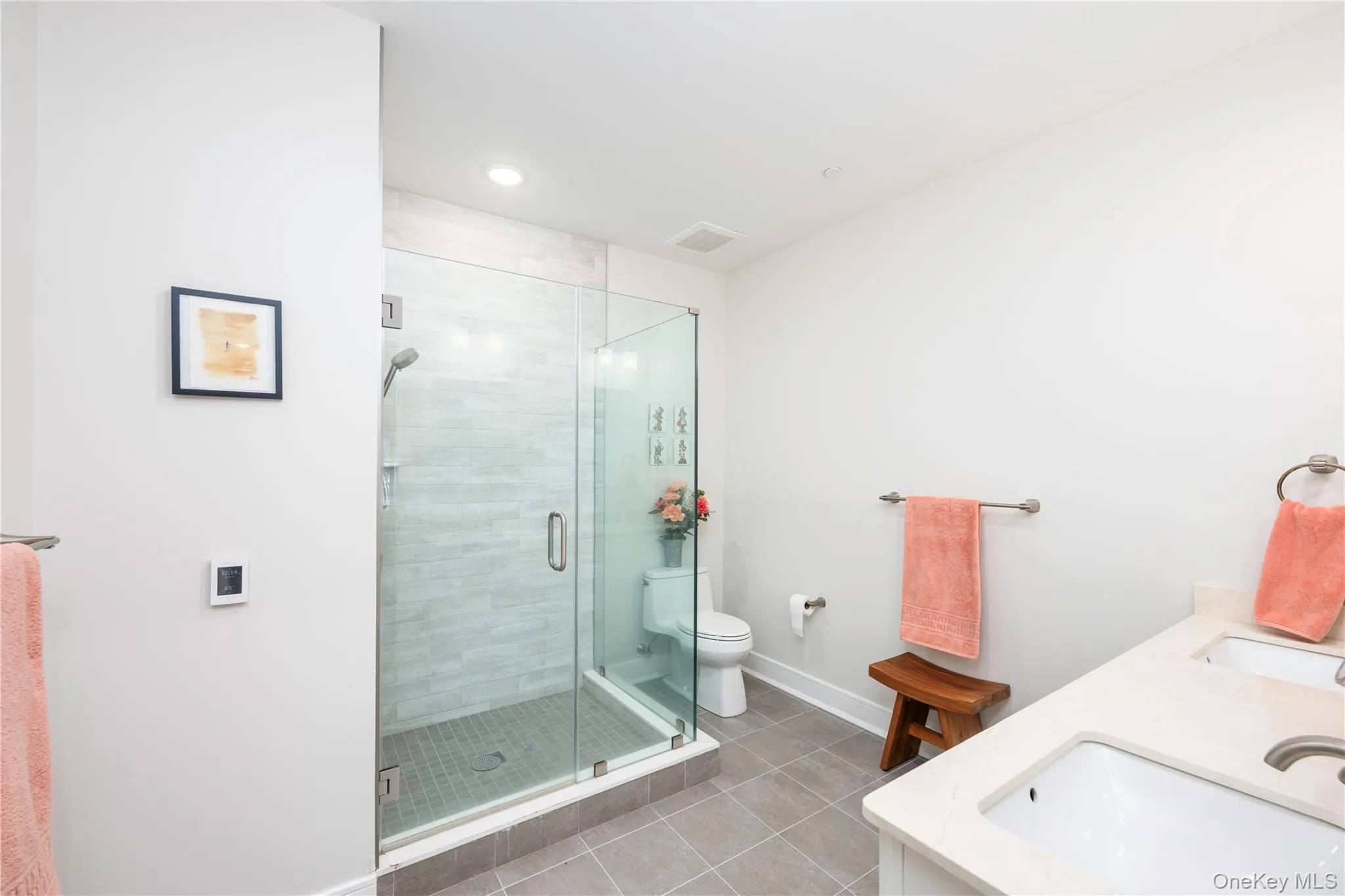 Primary Bathroom with radiant heat floors. Primary Bathroom with radiant heat floors.