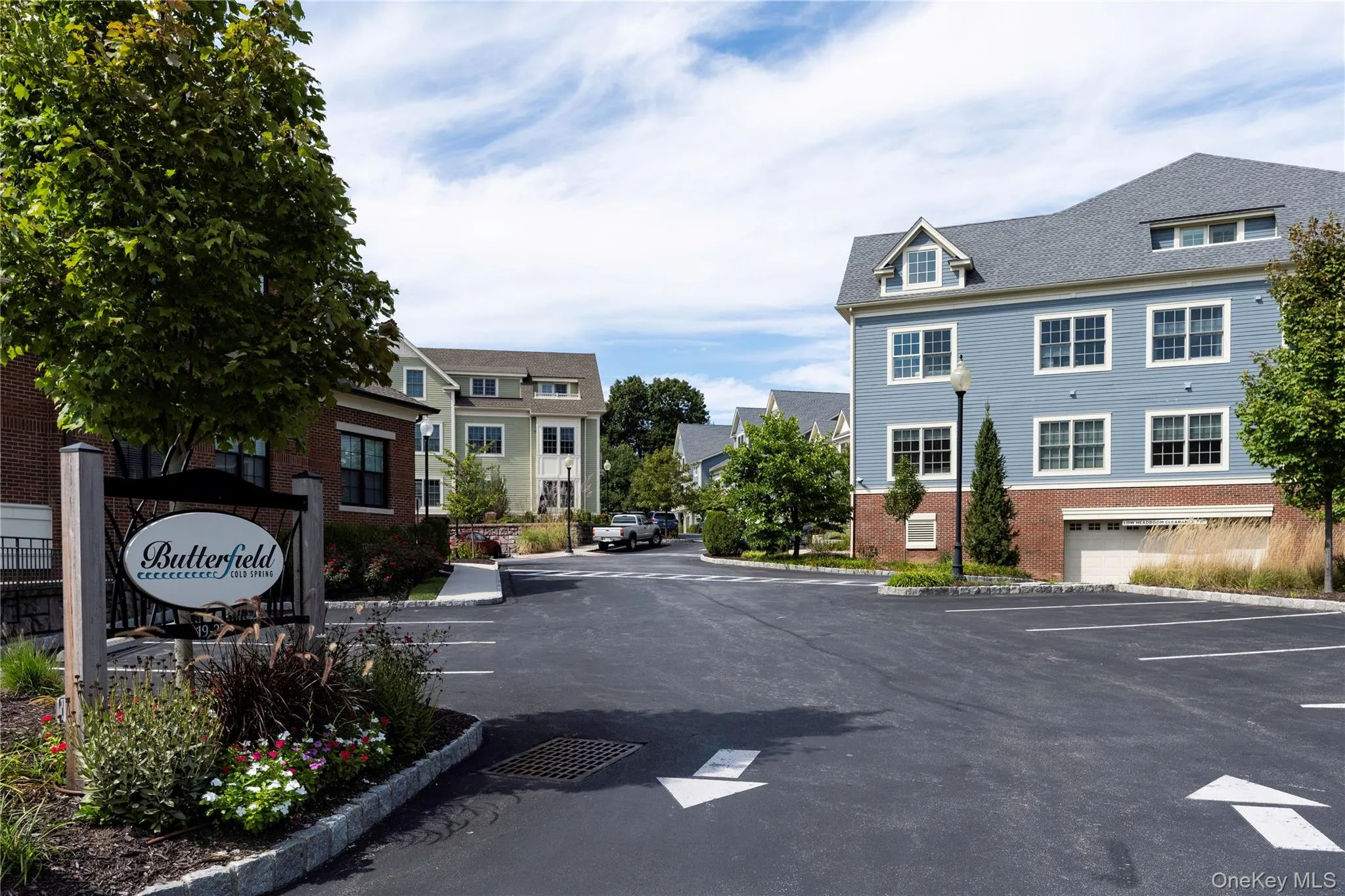 Lit outdoor access with garage space and storage in lower level, all with an elevator. Lit outdoor access with garage space and storage in lower level, all with an elevator.