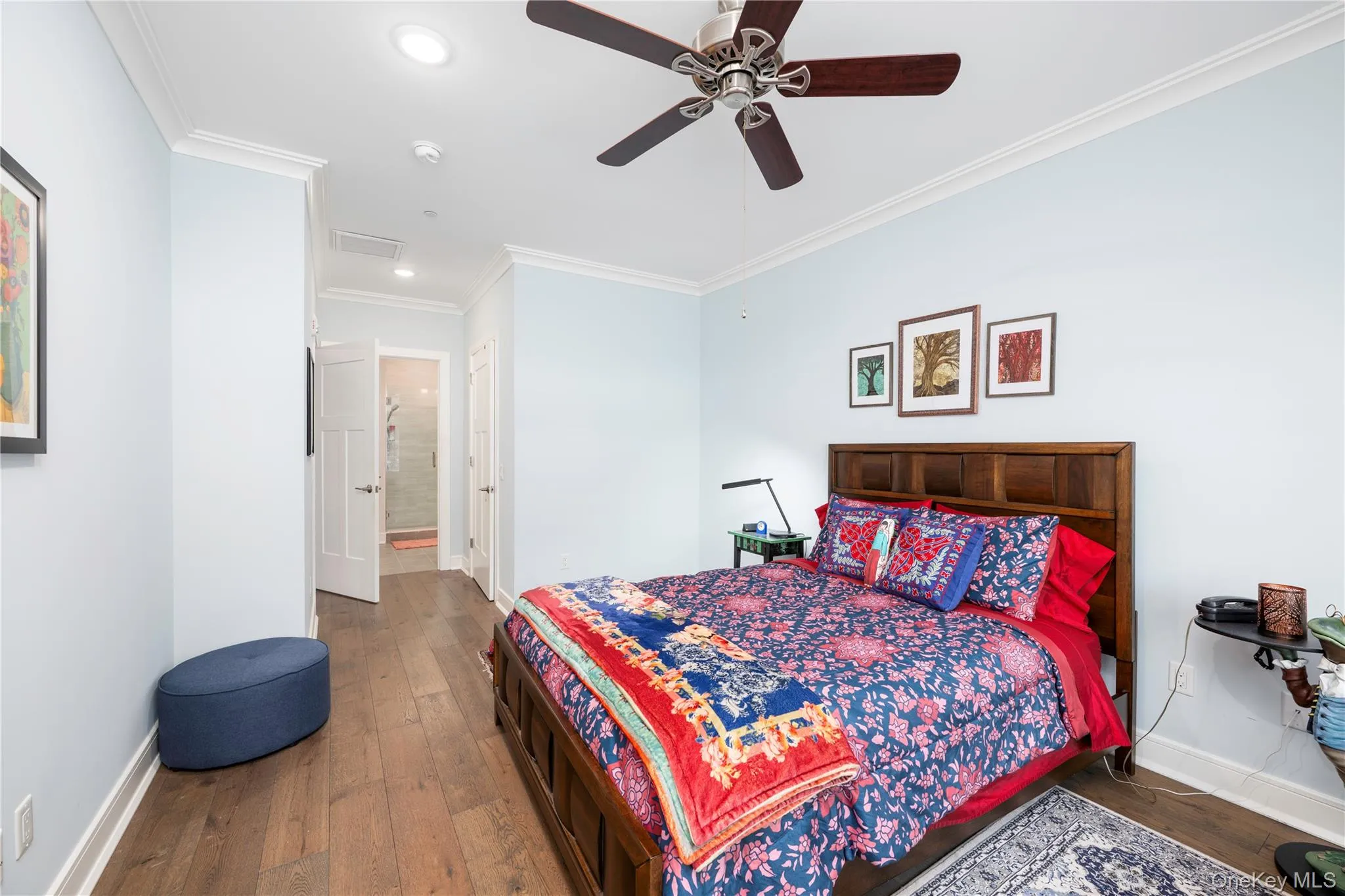 Primary ensuite with walk-in closet and attached primary bath. Primary ensuite with walk-in closet and attached primary bath.