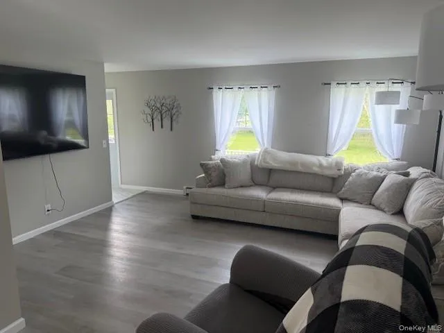 Large open concept living-room, kitchen and dinning room area. Large open concept living-room, kitchen and dinning room area.