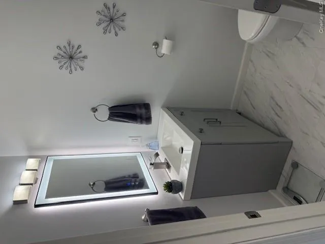 First floor half bathroom. First floor half bathroom.