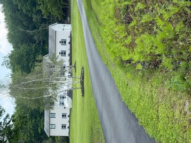Paved driveway & front of the home Paved driveway & front of the home