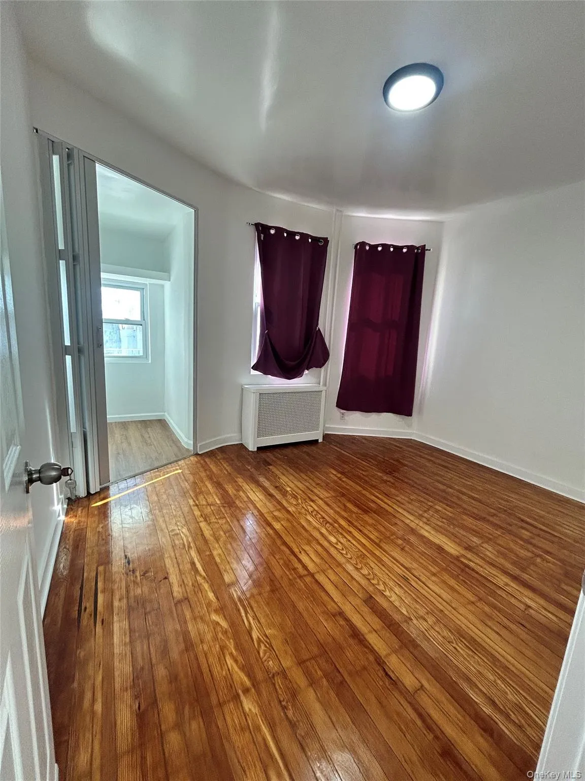 1st bedroom with walk in closet 1st bedroom with walk in closet