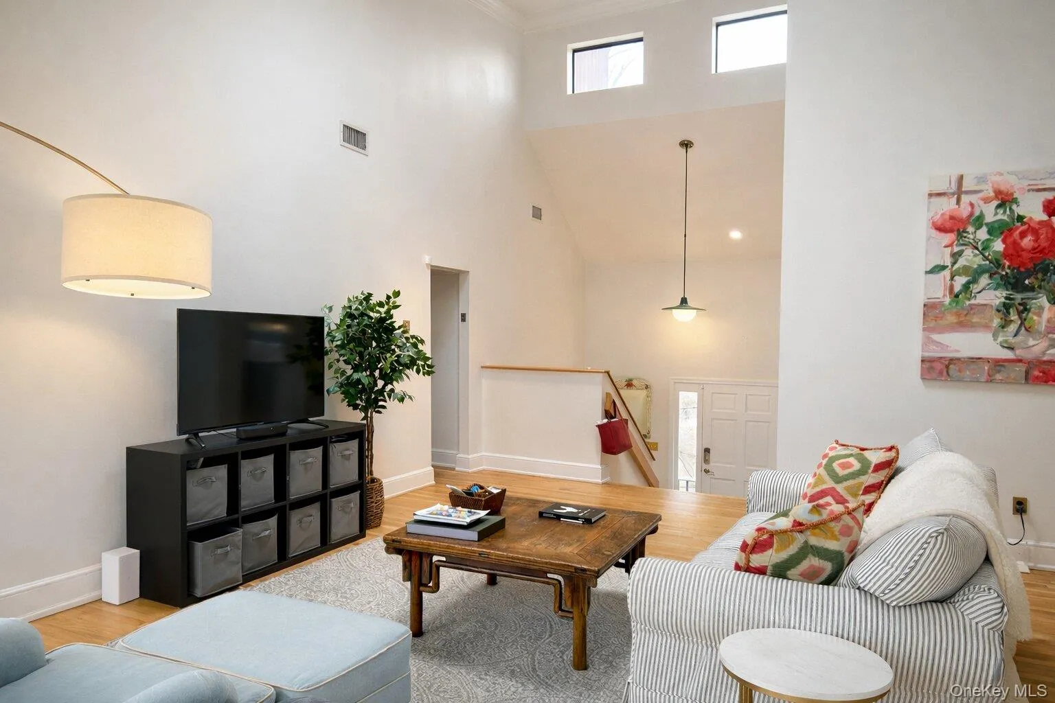 Sunny living room with high ceilings Sunny living room with high ceilings