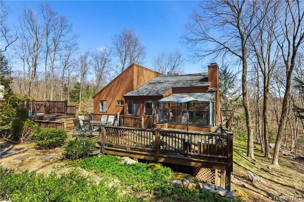 Back of house with deck Back of house with deck