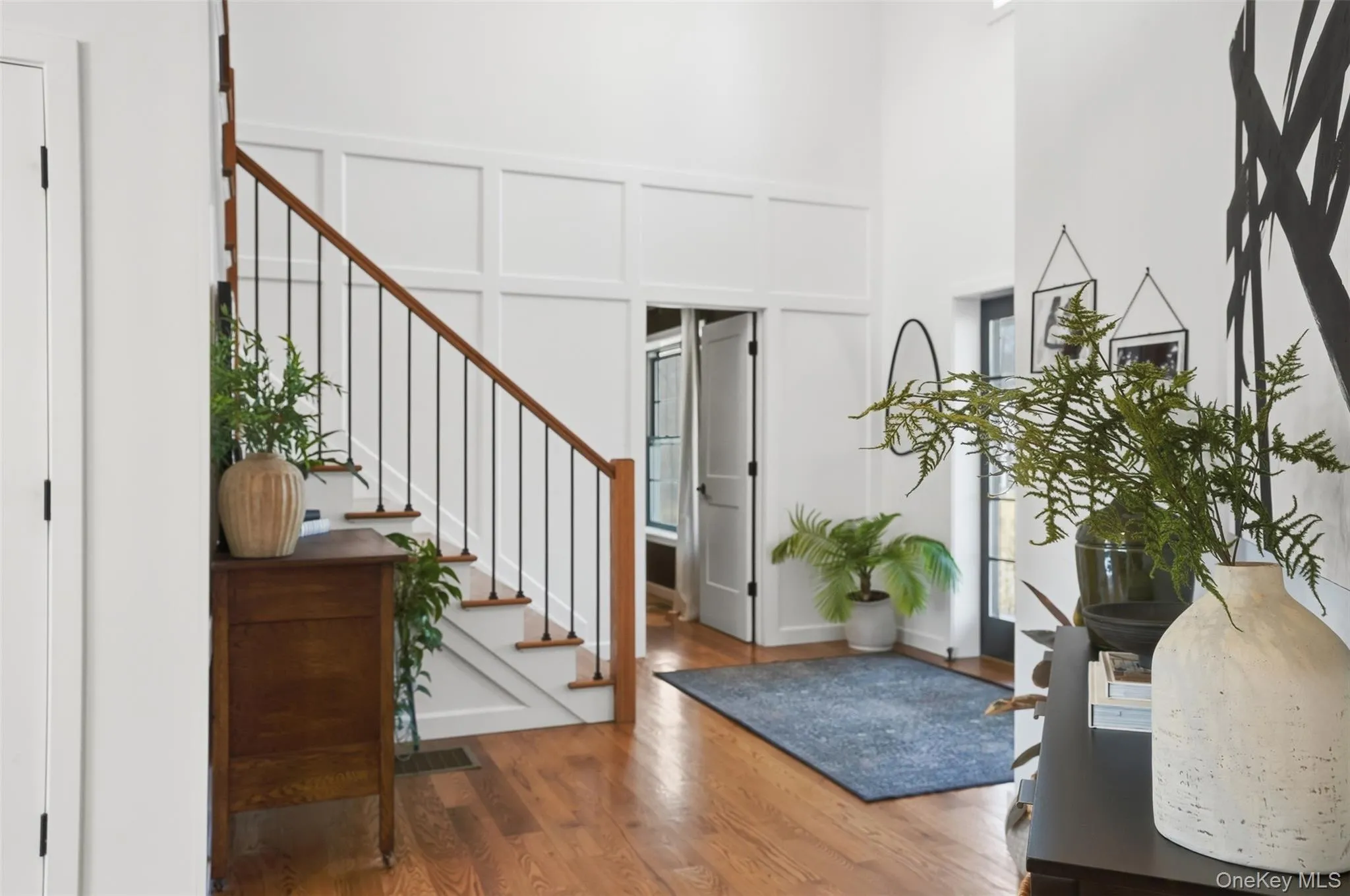 Gorgeous hardwood floors throughout, custom railing to 2nd level. A truly special first impression as you walk in the front door. Gorgeous hardwood floors throughout, custom railing to 2nd level. A truly special first impression as you walk in the front door.