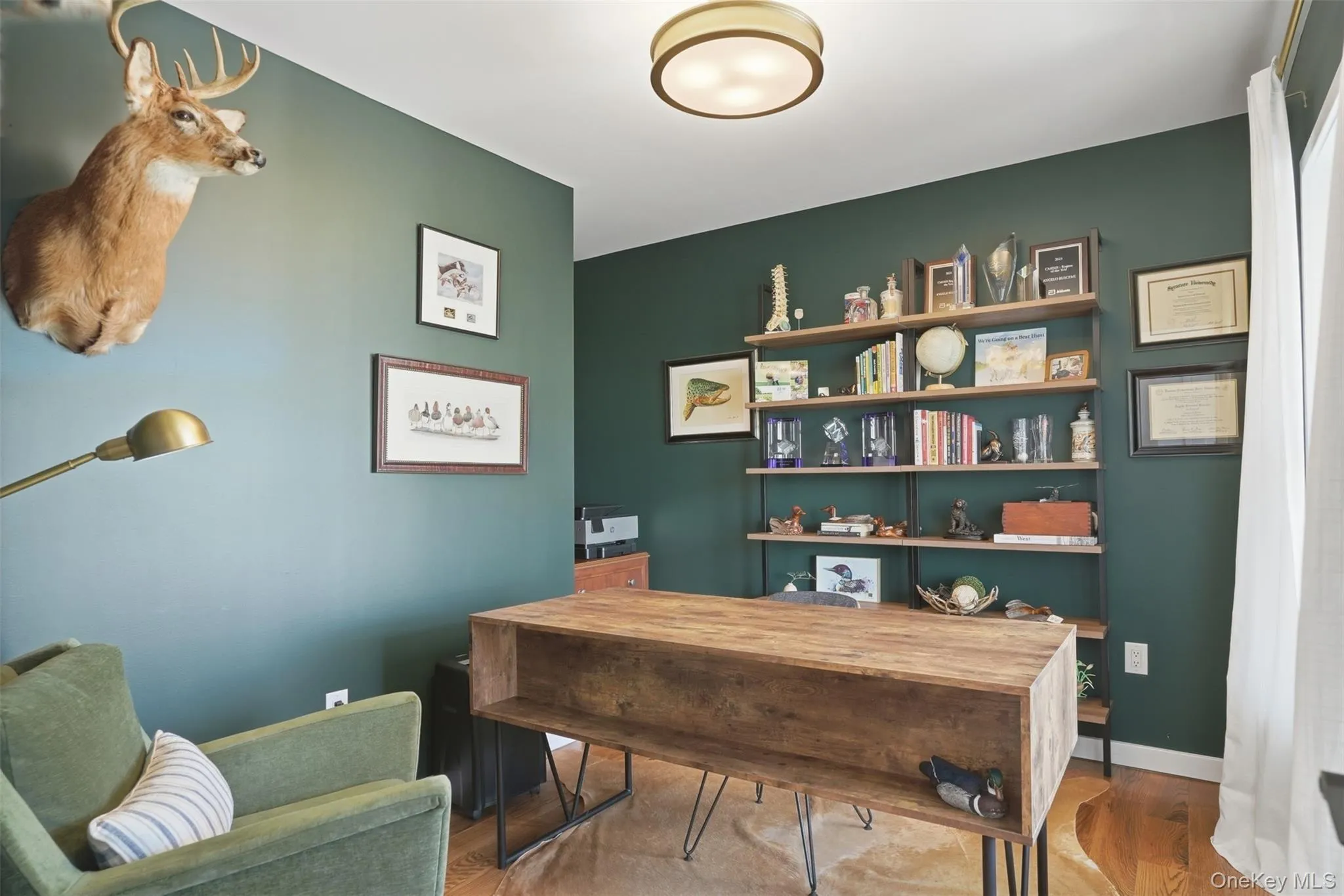 A handsome office off the front hallway is the perfect spot for a quiet workspace or library. A handsome office off the front hallway is the perfect spot for a quiet workspace or library.