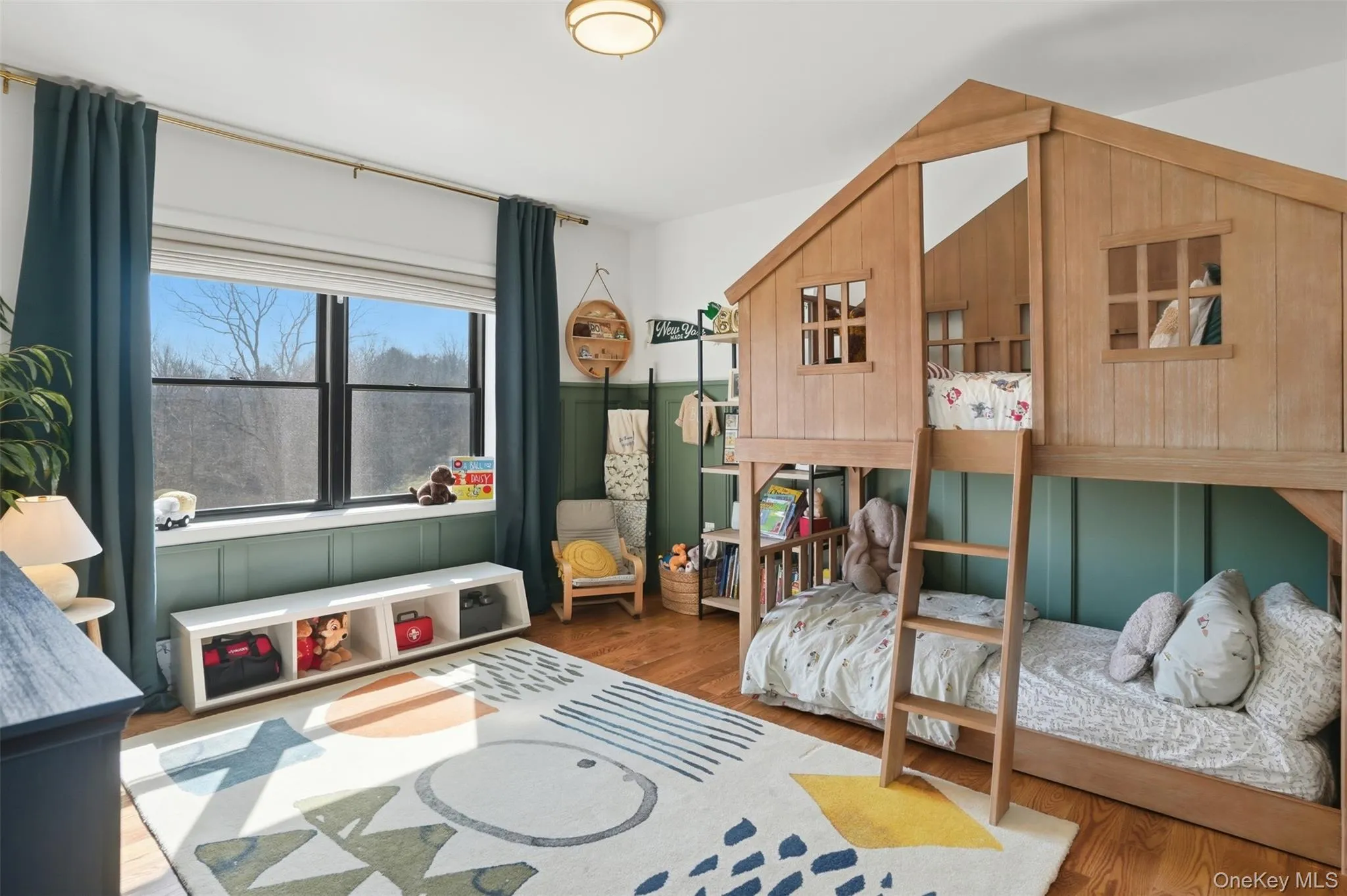 Picture perfect bedroom with hardwood floors, large windows and closet Picture perfect bedroom with hardwood floors, large windows and closet