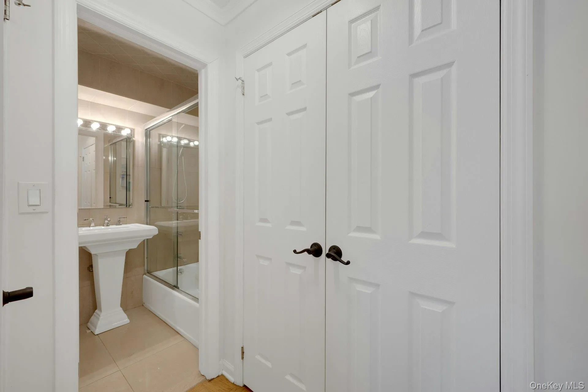 Updated bathroom with large hall closet. Updated bathroom with large hall closet.