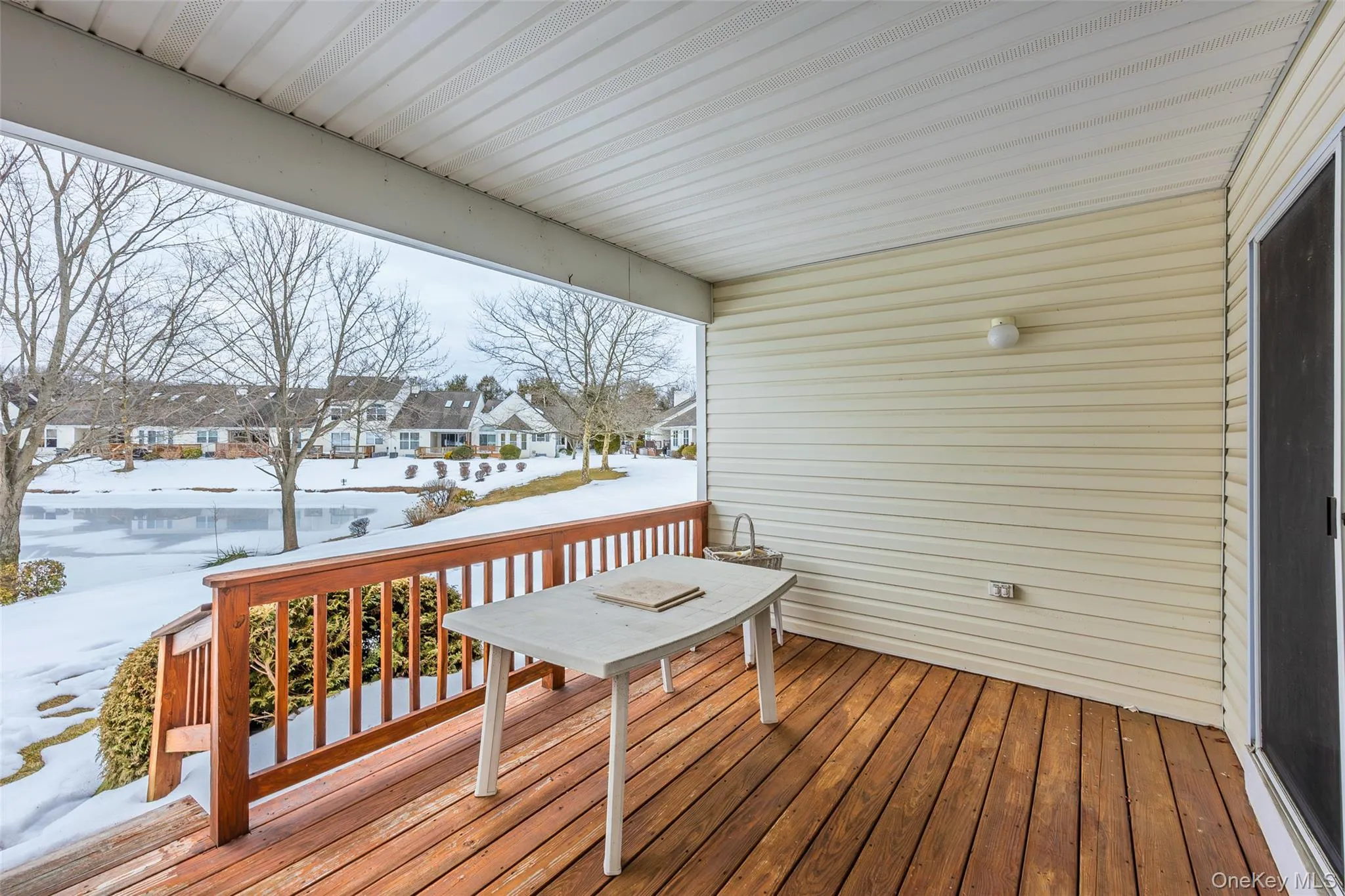 Covered deck overlooking the pond Covered deck overlooking the pond