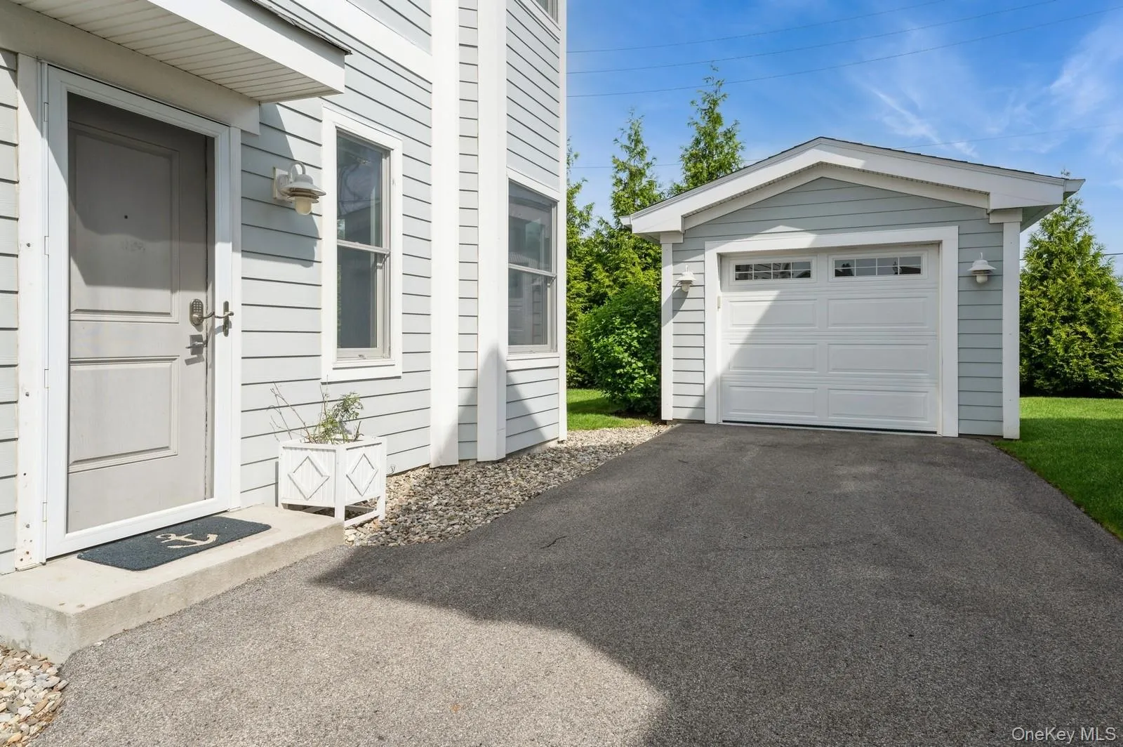 Detached garage and side door entrance Detached garage and side door entrance