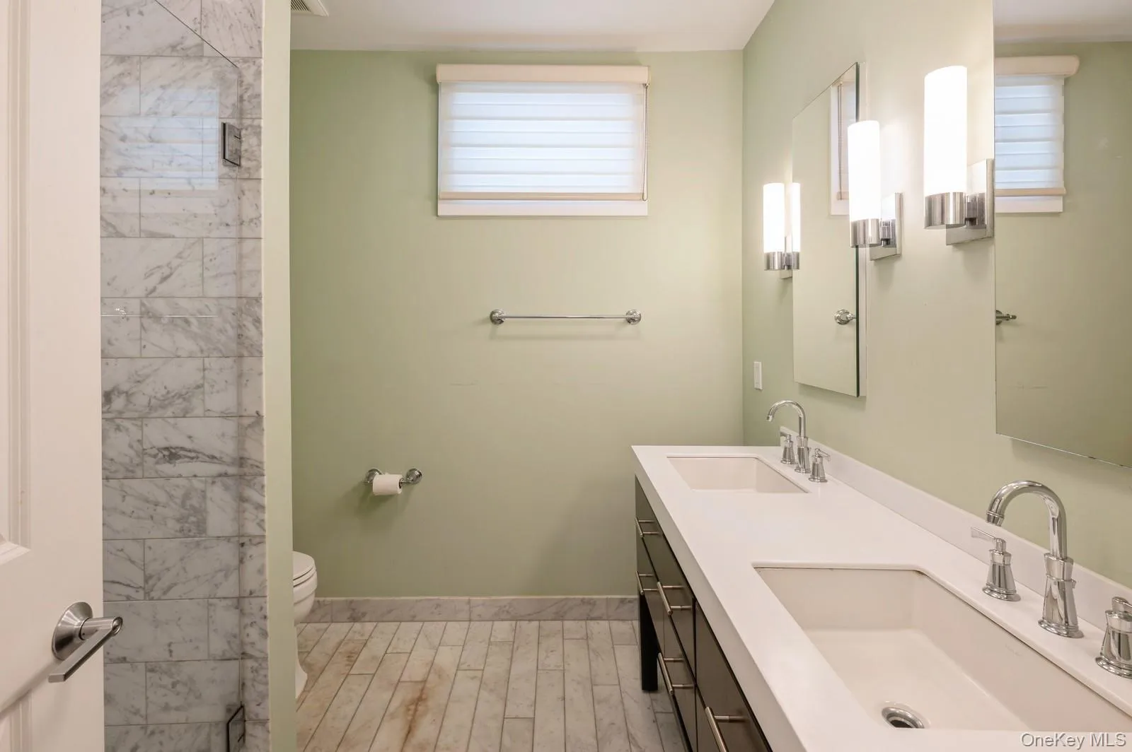Full bathroom with toilet, double vanity Full bathroom with toilet, double vanity