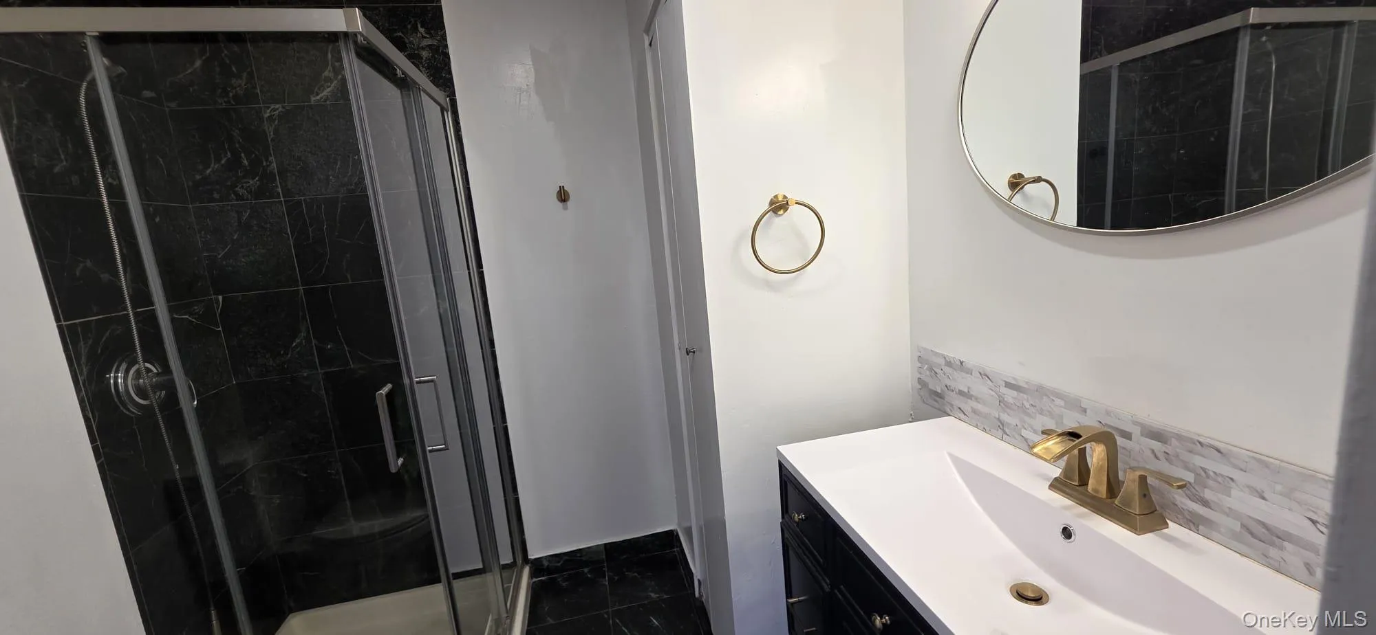 Ensuite with shower stall and linen closet. Ensuite with shower stall and linen closet.