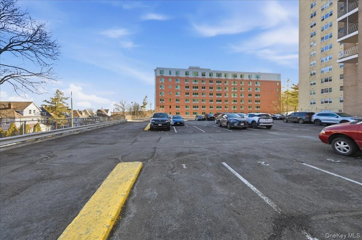 View of uncovered parking lot View of uncovered parking lot