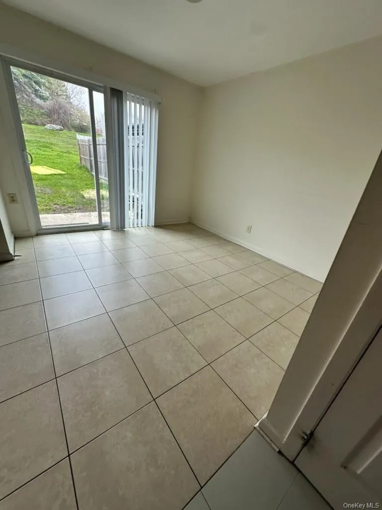 Eat-in kitchen with slider door to the back yard. Eat-in kitchen with slider door to the back yard.