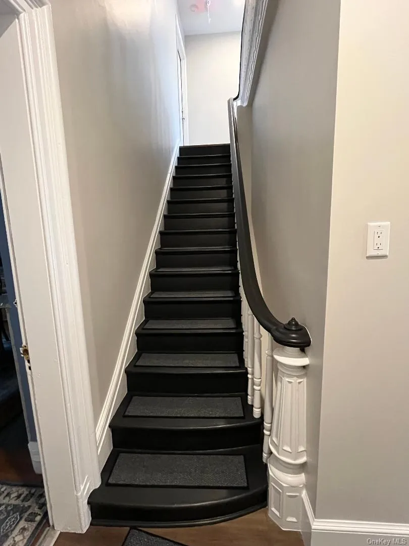 Stairs leading to 2nd floor apartment. Stairs leading to 2nd floor apartment.