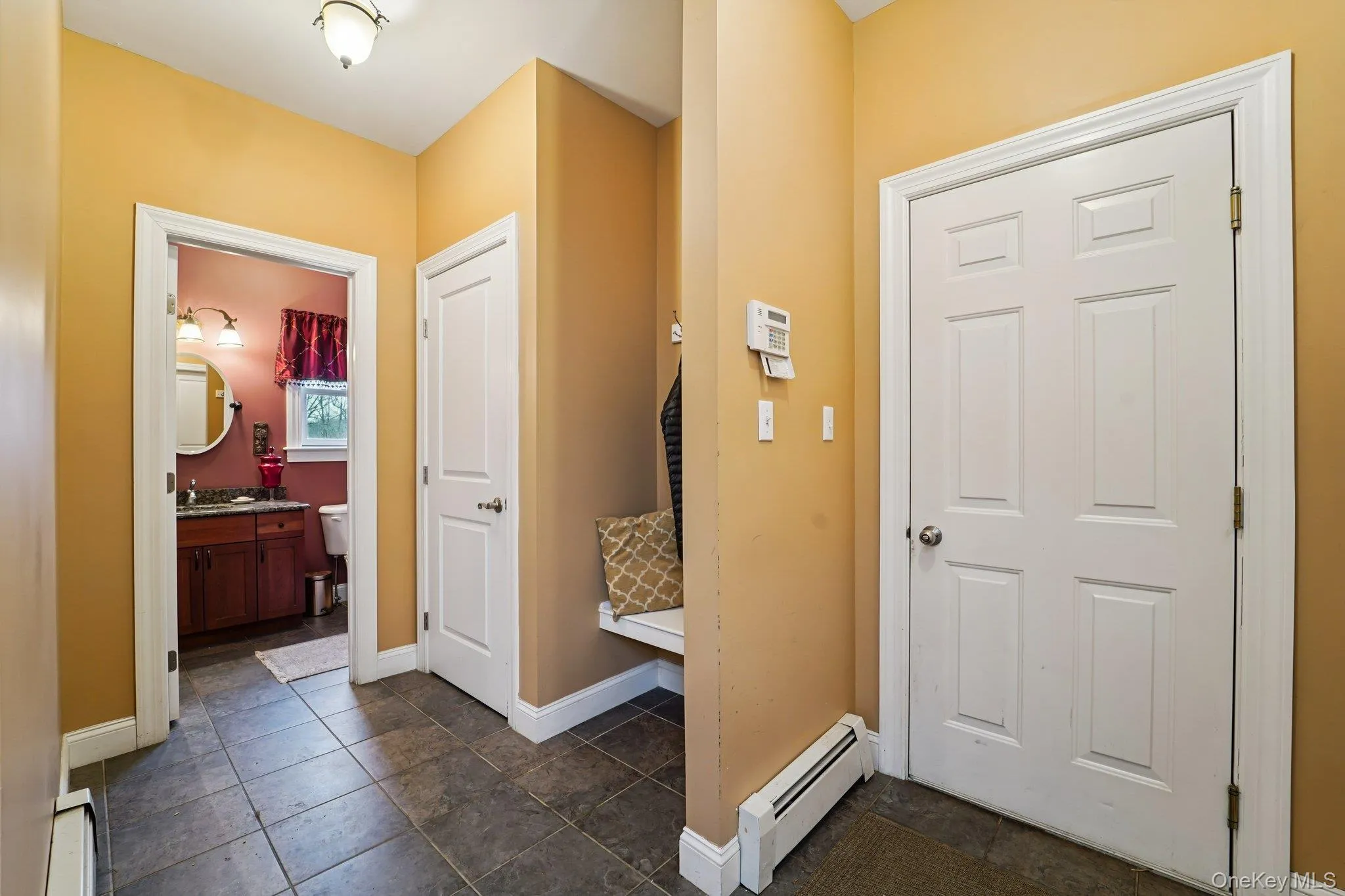 Entrance from 2 Car Garage and Powder Room Entrance from 2 Car Garage and Powder Room
