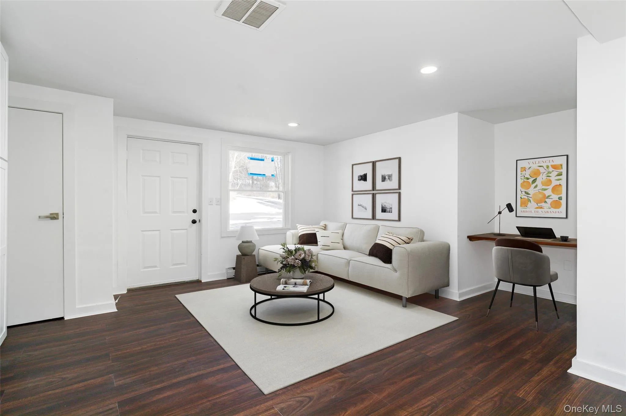 Virtually staged Living area with baseboards, dark wood-style flooring, and recessed lighting Virtually staged Living area with baseboards, dark wood-style flooring, and recessed lighting