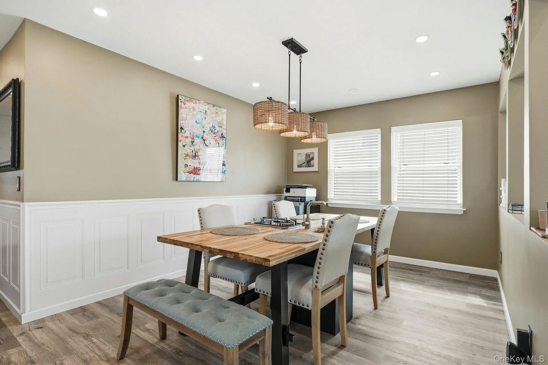 Dining space featuring light wood-style floors and recessed lighting Dining space featuring light wood-style floors and recessed lighting