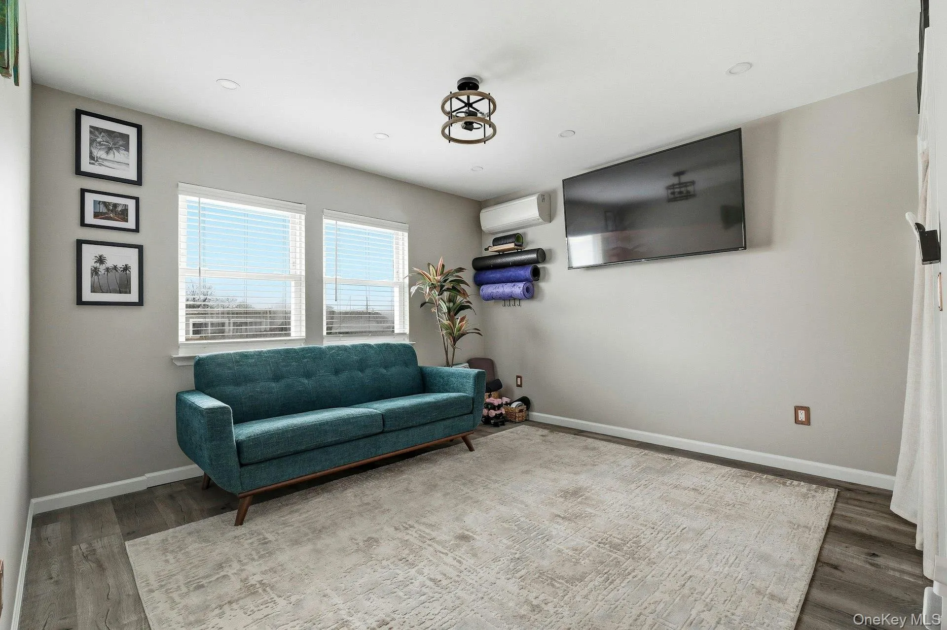 Bedroom overlooking water wth spacious closet& dark wood style finished floors Bedroom overlooking water wth spacious closet& dark wood style finished floors