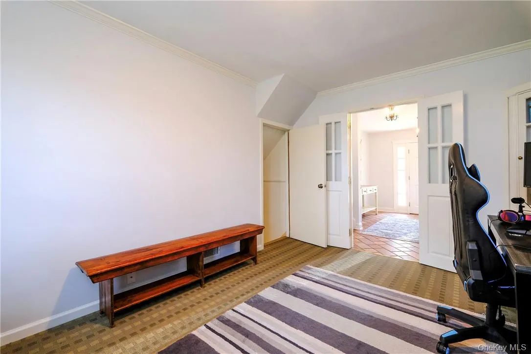 Office/computer room w/view of Entry foyer and door to ground level rooms Office/computer room w/view of Entry foyer and door to ground level rooms