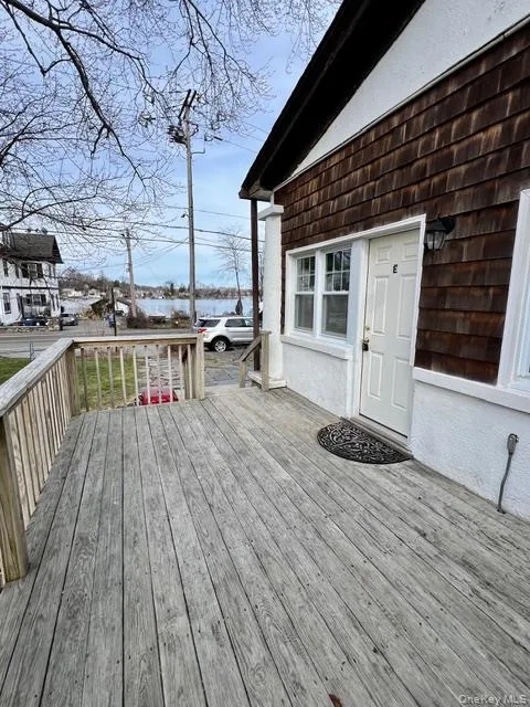 Private deck and private entrance with views of Lake Mahopac across the street. Private deck and private entrance with views of Lake Mahopac across the street.