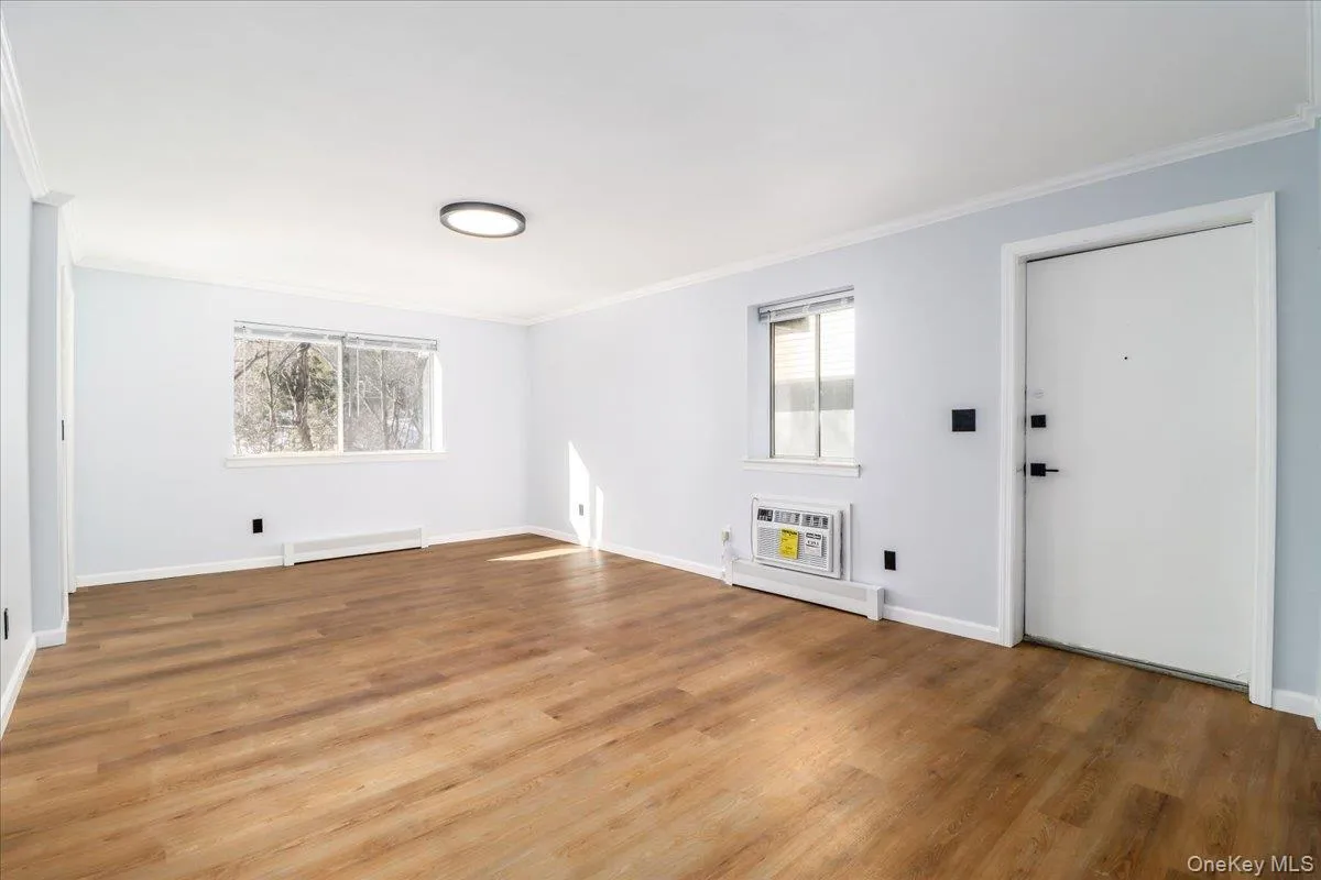 Spacious Living Room with new flooring & freshly painted! Spacious Living Room with new flooring & freshly painted!