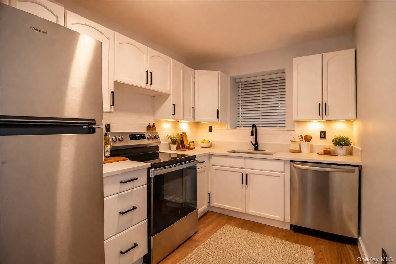 Beautiful updated kitchen with brand new appliances (virtually staged) Beautiful updated kitchen with brand new appliances (virtually staged)