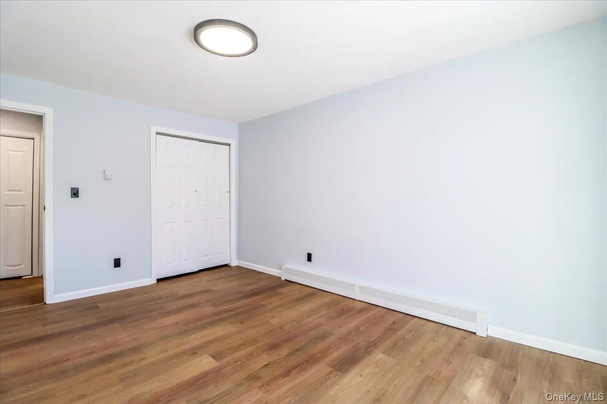 Spacious Bedroom, with sliders out to patio, freshly painted , new flooring Spacious Bedroom, with sliders out to patio, freshly painted , new flooring