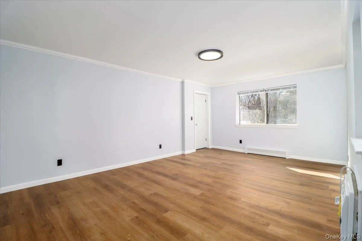 Spacious Living Room with new flooring & freshly painted! Spacious Living Room with new flooring & freshly painted!